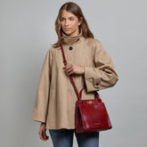 Sac à main en cuir avec bandoulière Story - Barolo/gold | The Bridge
