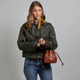 Mini leather bucket bag with shoulder strap | The Bridge
