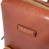 Small leather women's backpack with front pocket | The Bridge