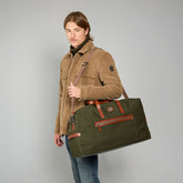 Medium leather and fabric duffle bag | The Bridge