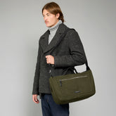 Leather and fabric travel duffle bag with shoulder strap | The Bridge