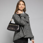 Leather crossbody bag with front zip and flap closure | The Bridge