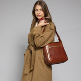 Leather shoulder bag with front zip | The Bridge